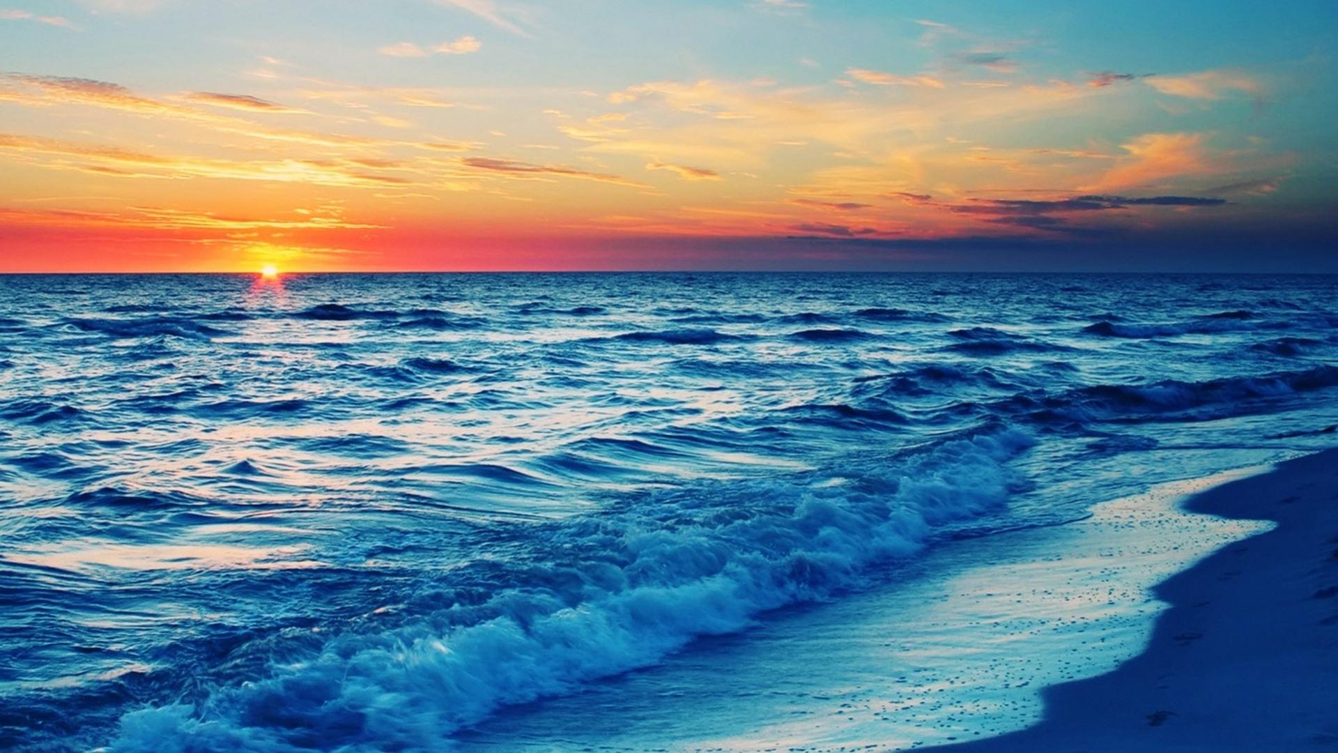 落日下美丽海滩风景桌面壁纸-壁纸图片大全