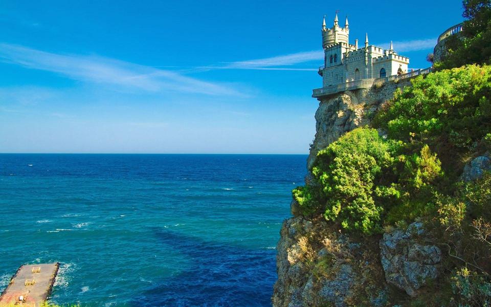 悬崖上的城堡高清海边风景桌面壁纸